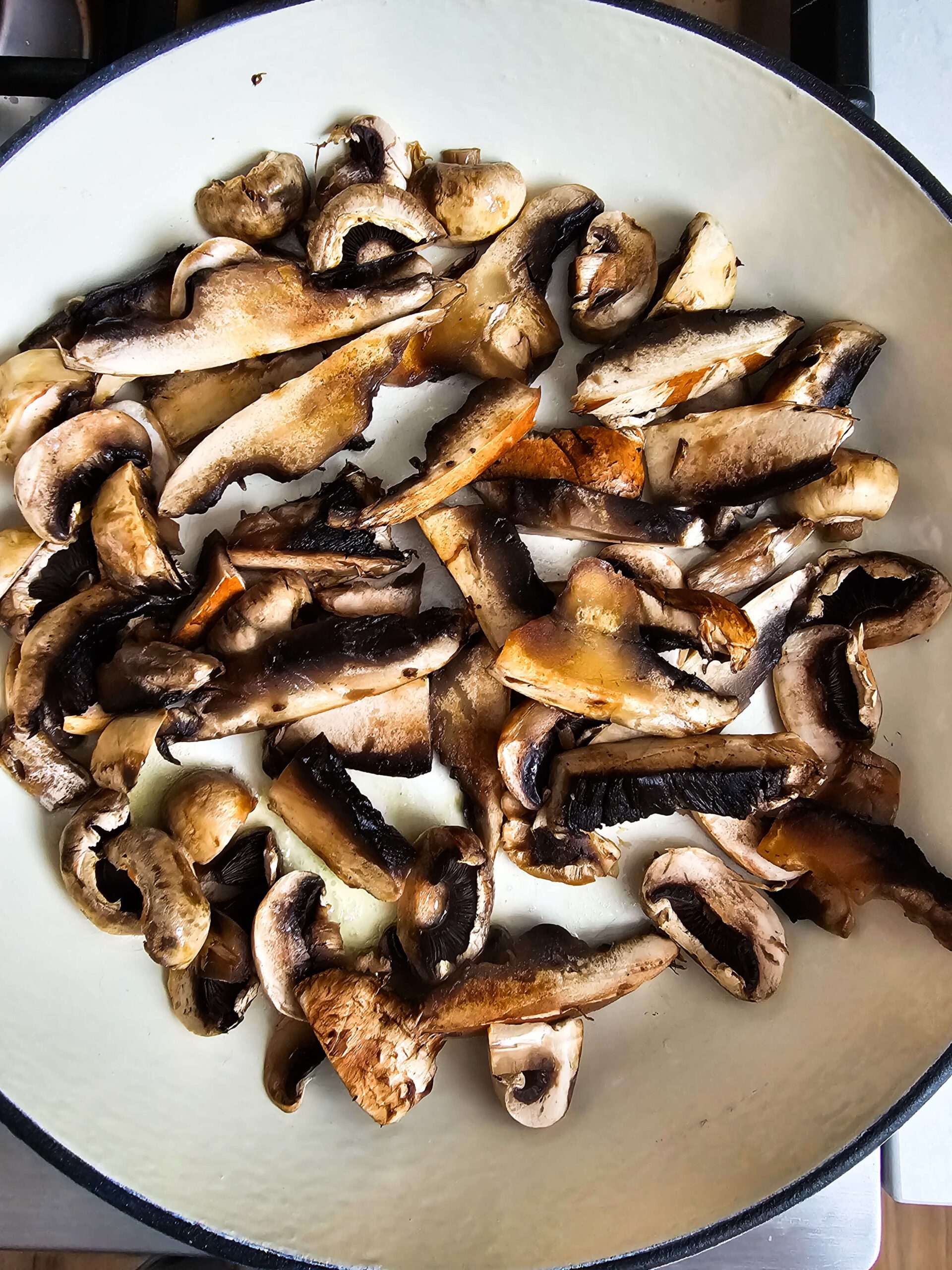 LARGE CAST ENAMAL SKILLET TO SAUTE AND REMOVE THE MOISTURE FROM THE MUSHROOMS