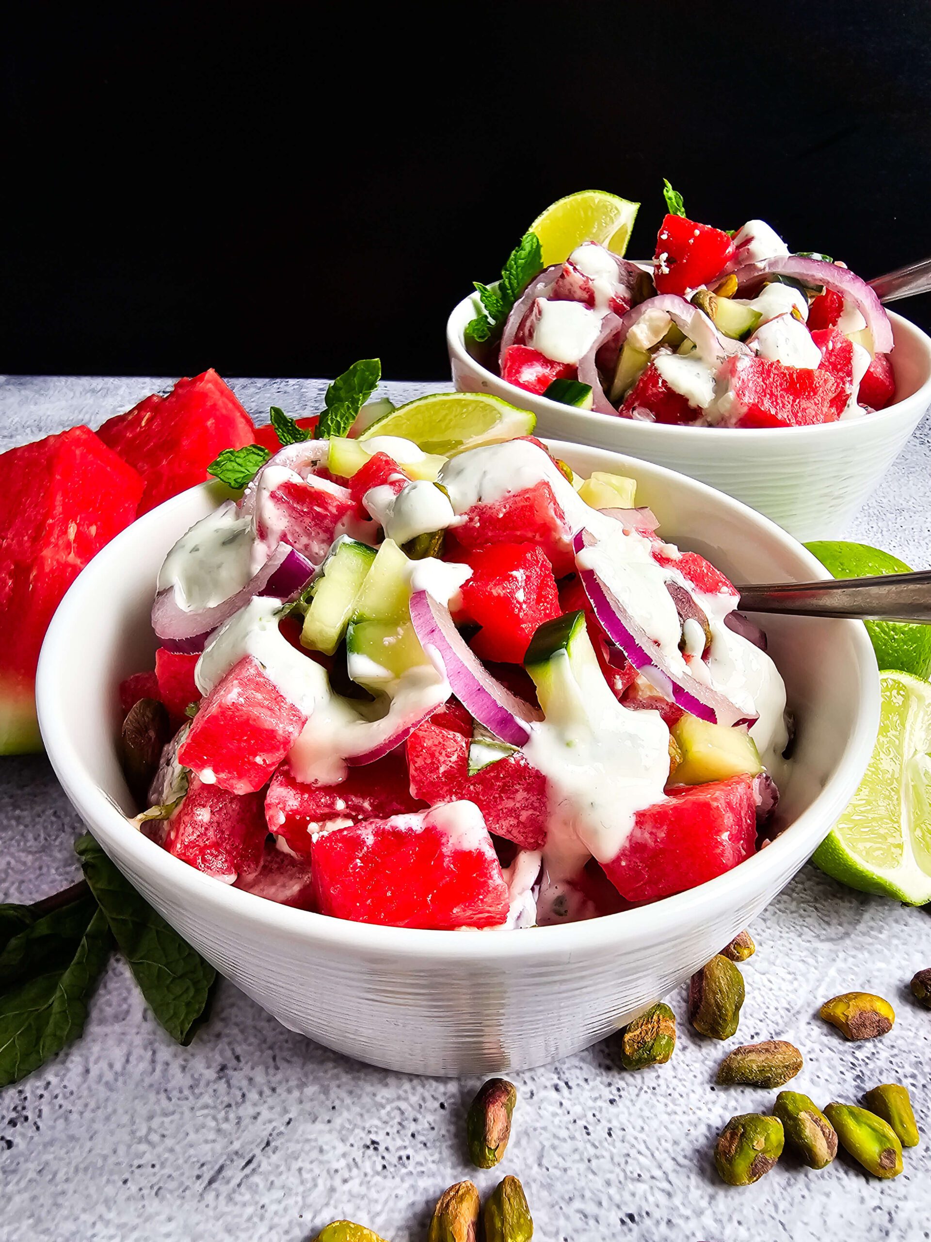 SERVE THE SALAD IMMEDIATELY BOWLS OF WATERMELON SALAD READY TO SERVE