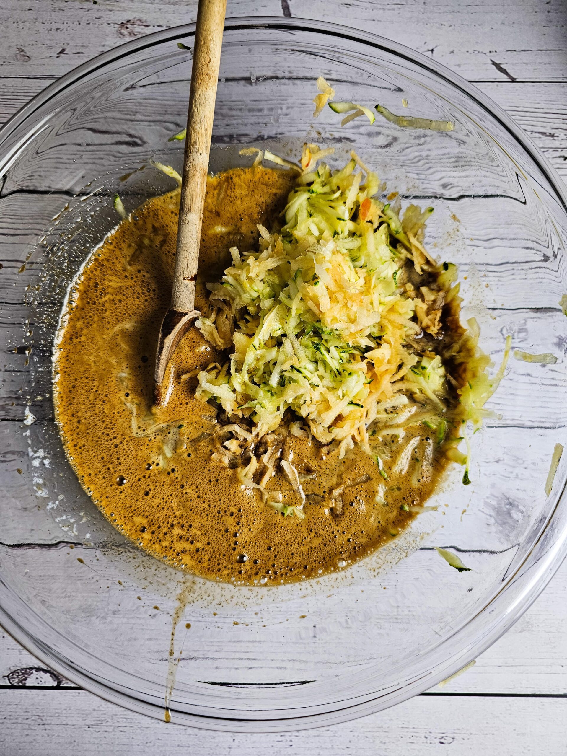 COMBINE THE WET INGREDIENTS WITH THE APPLE AND ZUCCHINI IN A GLASS BOWL