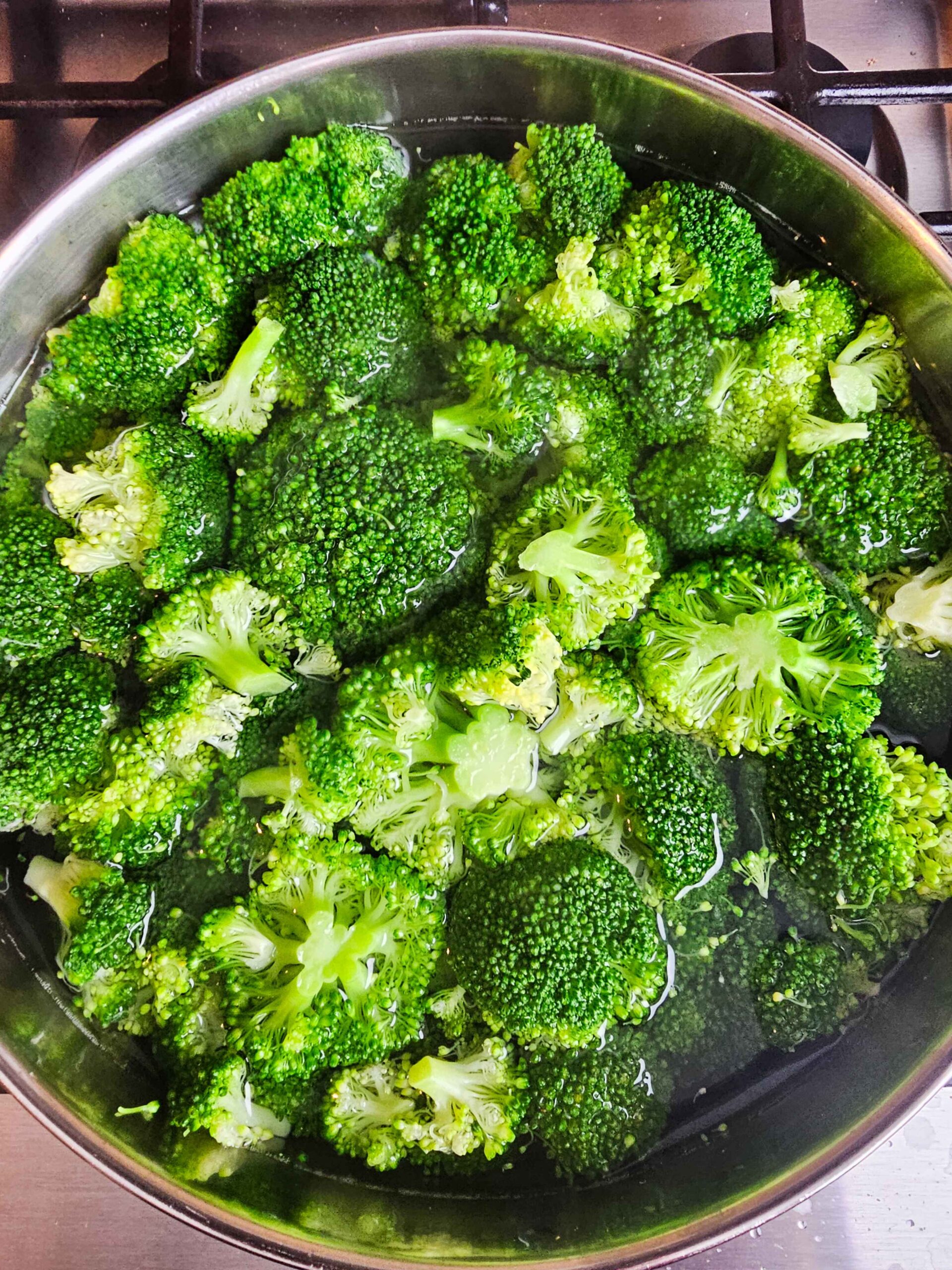BLANCH THE BROCCOLI 2 MINUTES AND DRAIN AND RUN COLD WATER OVER THE FLORETS TO STOP THE COOKING