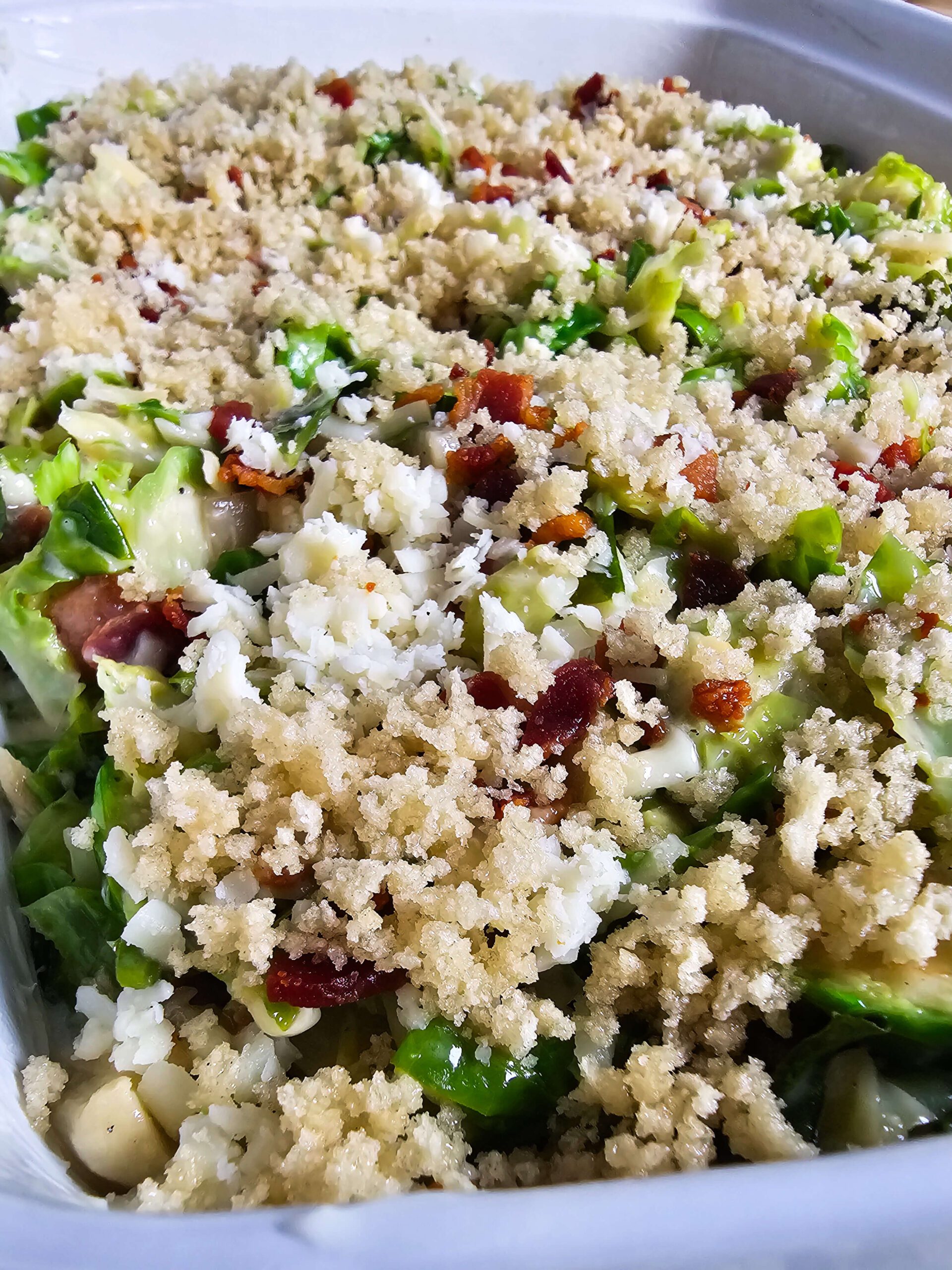 POUR INTO THE BAKING DISH AND TOP WITH THE PANKO BUTTER TOPPING