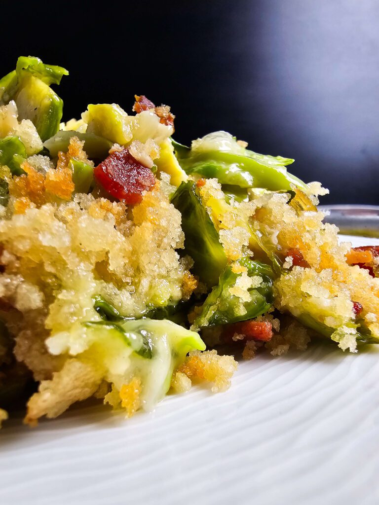 UP CLOSE SIDDE VIEW OF A SCOOPE OF BRUSSELS SPROUTS