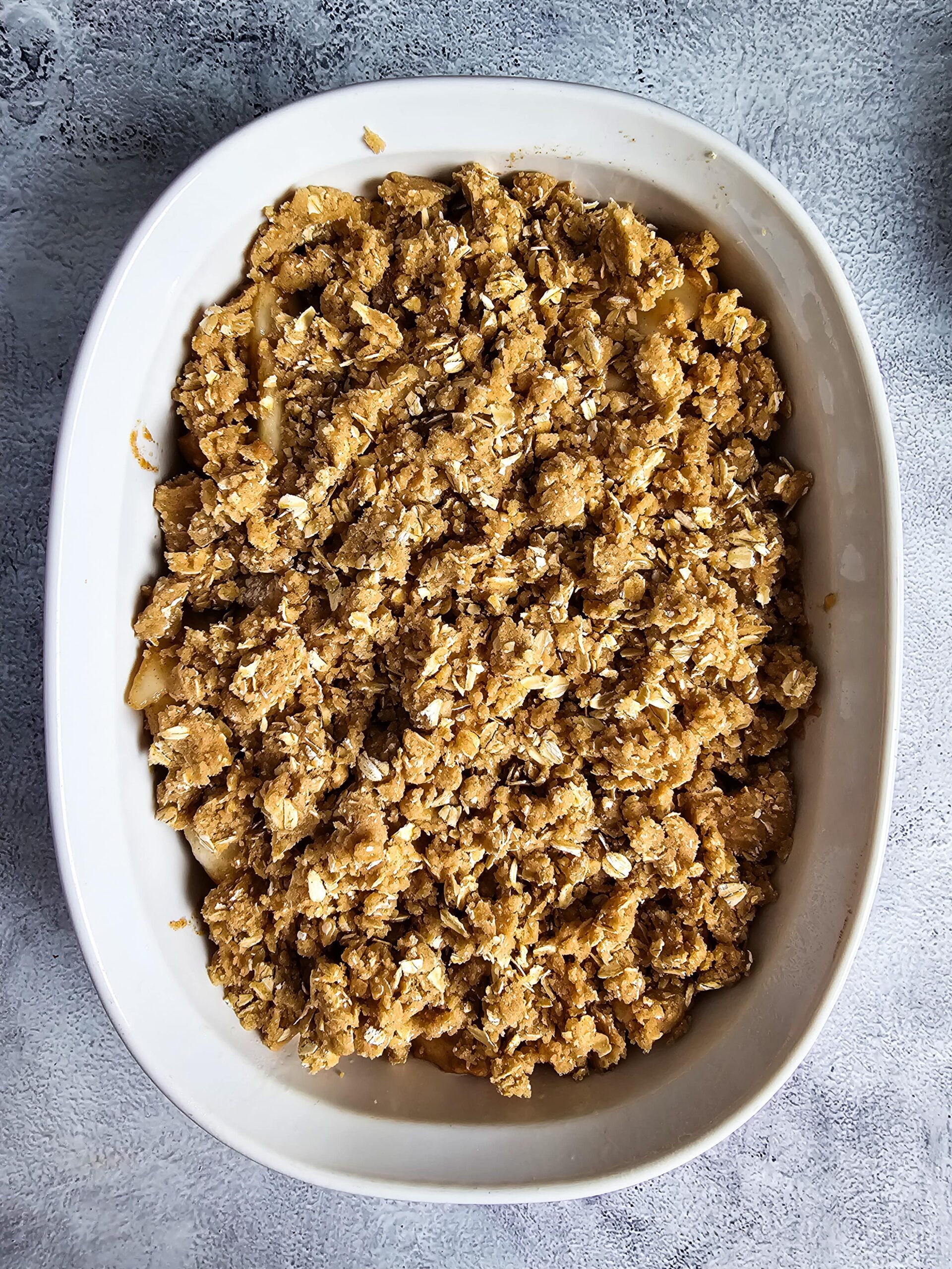 COMBINE THE PEARS AND TOPPING IN THE BAKING DISH