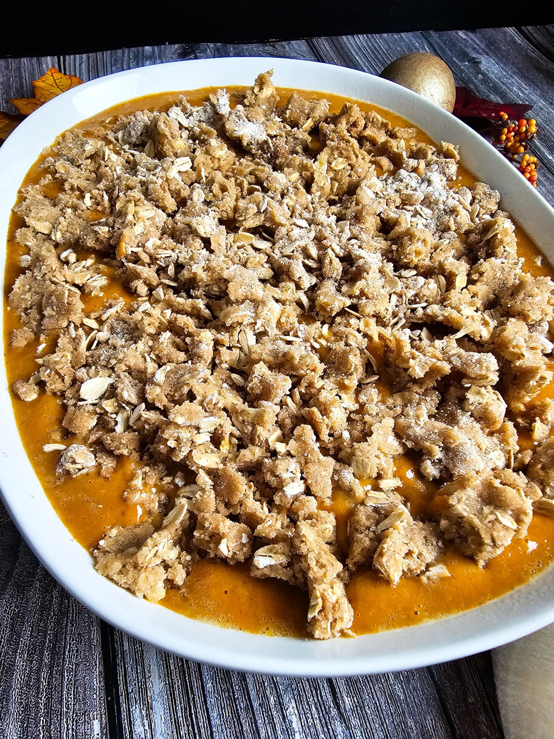 ADD THE CRUMBLE TOPPING AND CONTINUE TO BAKE FOR 30-35 MINUTES