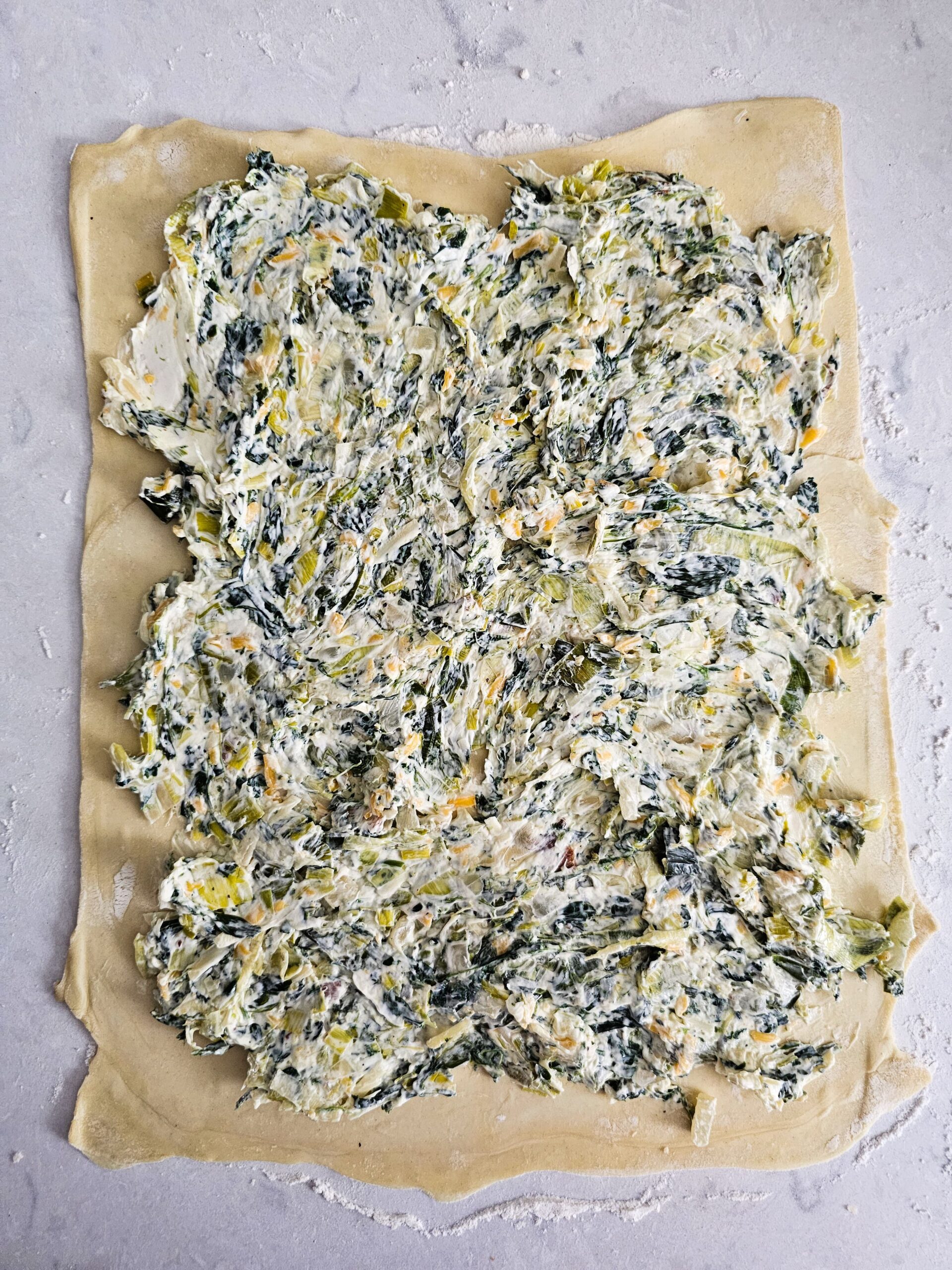 SPREAD THE FILLING EVENLY ON THE PUFF PASTRY