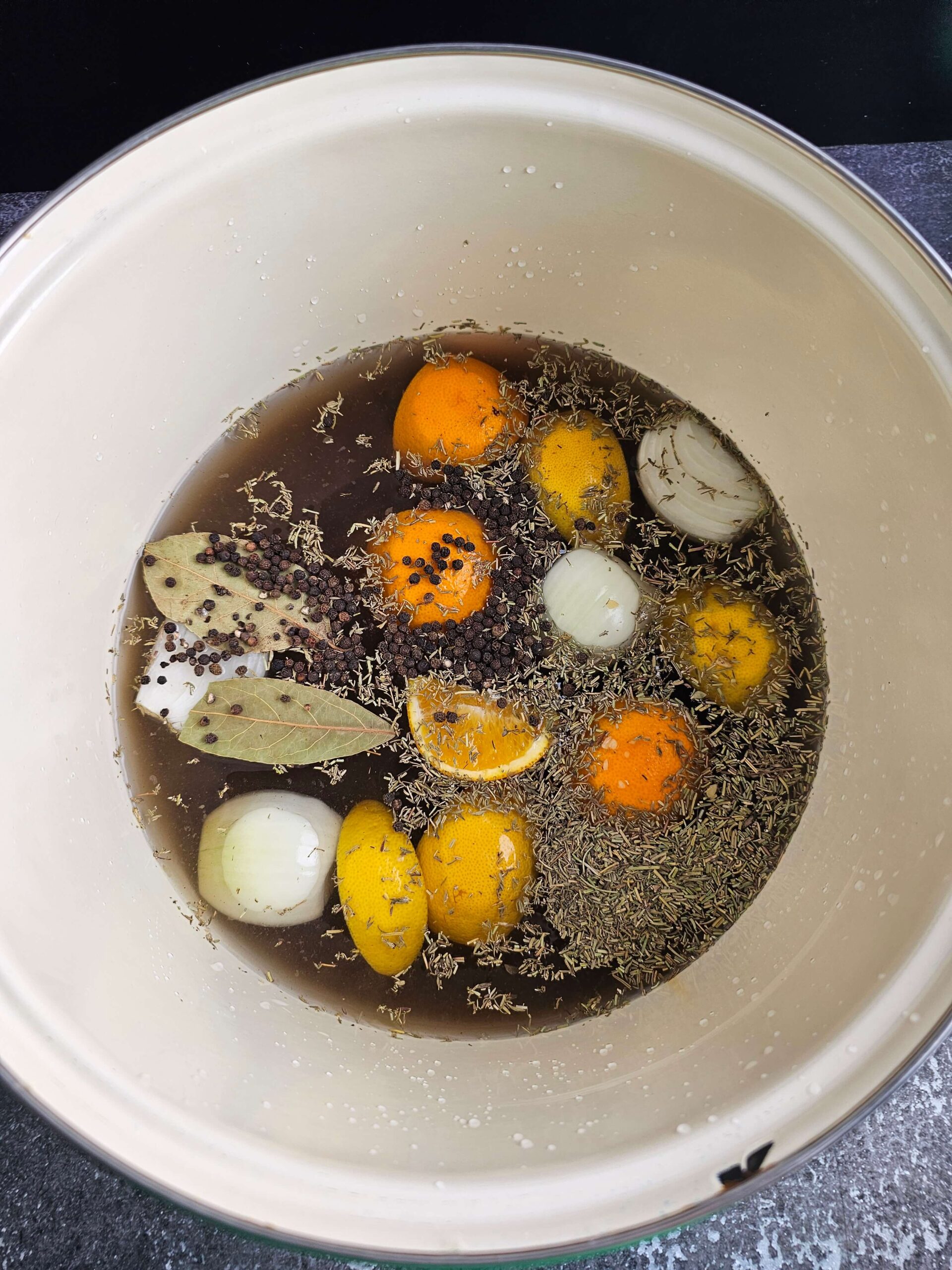 PLACE ALL BRINE INGREDIENTS IN A LARGE 16 QUART STOCK POT AND SET IT TO BOIL.