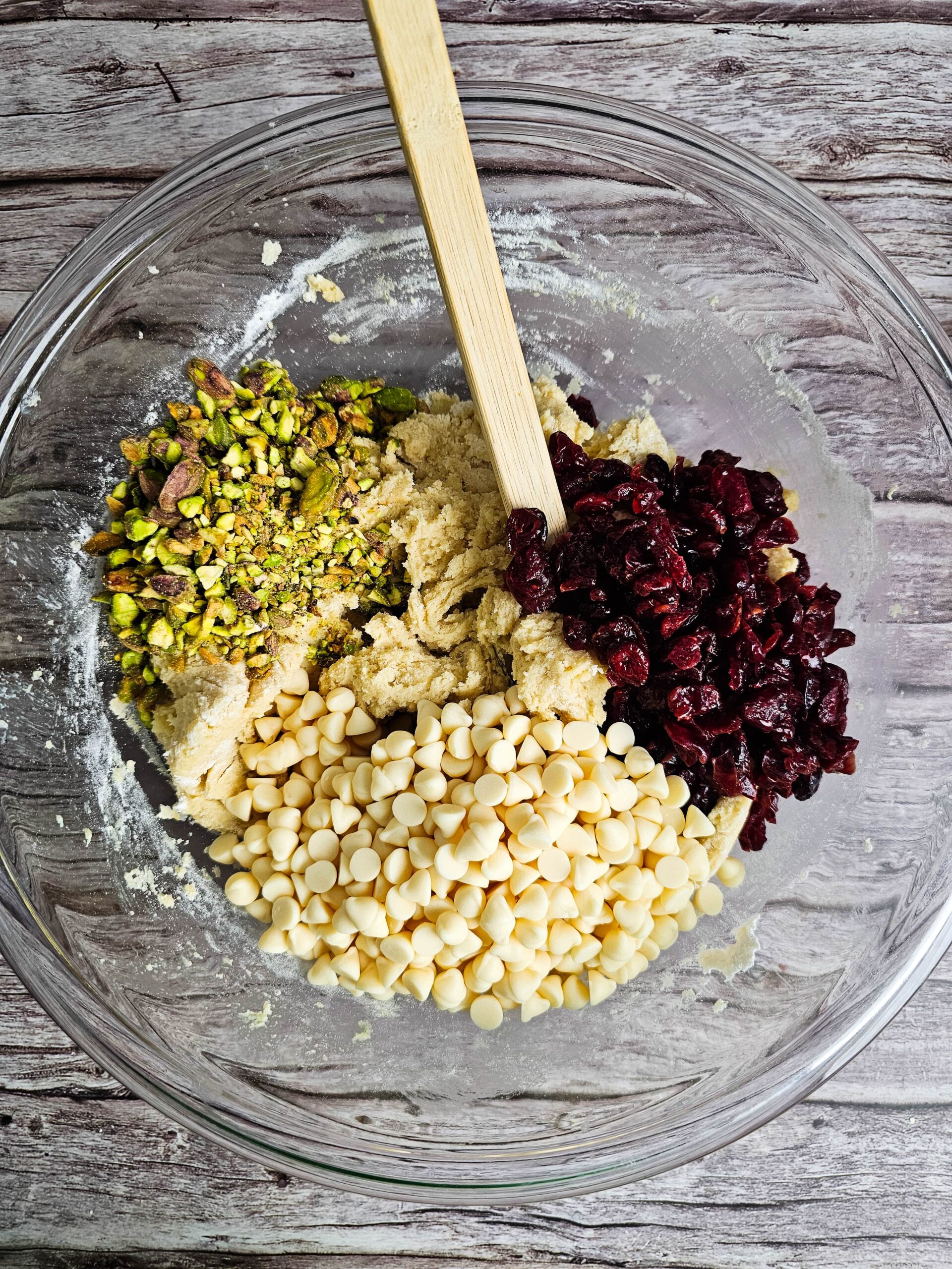ADD IN THE GOOD STUFF: WHITE CHOCOLATE CHIP, CRANBERRIES AND PISTACHIOS