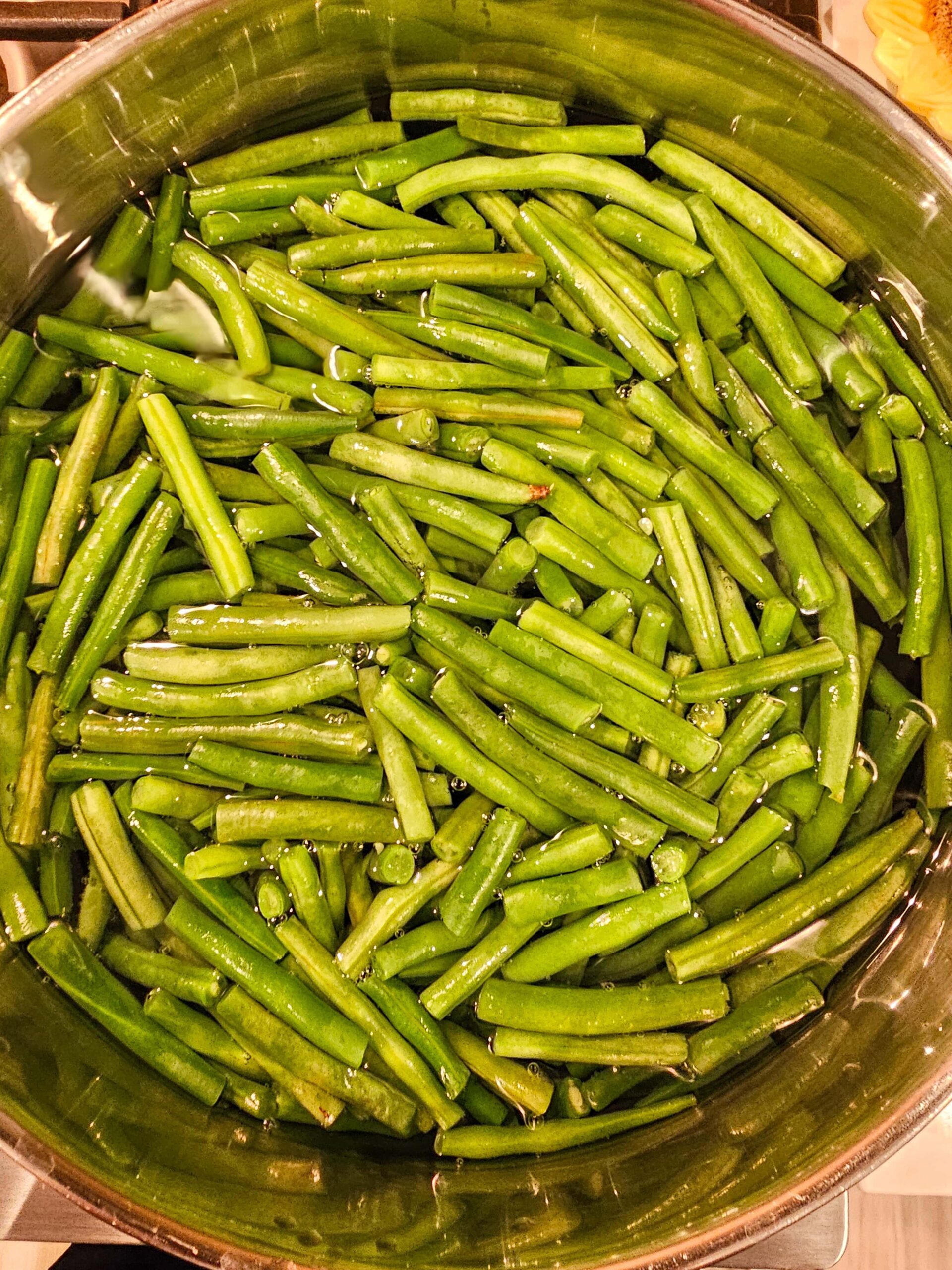 BLANCH THE GREEN BEANS IN BOILING WATER
