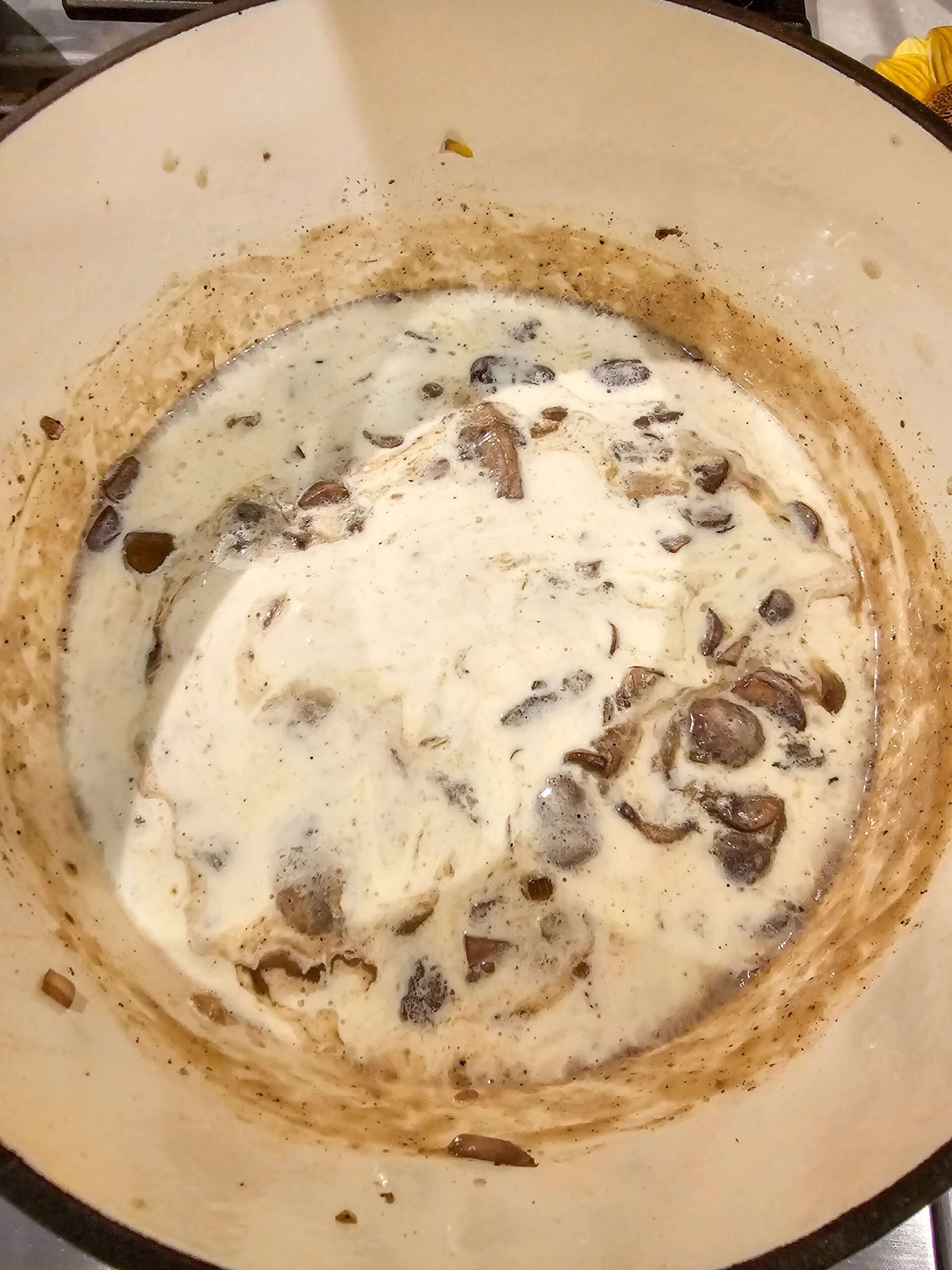 ADD THE HEAVY CREAM AND CHICKEN BROTH