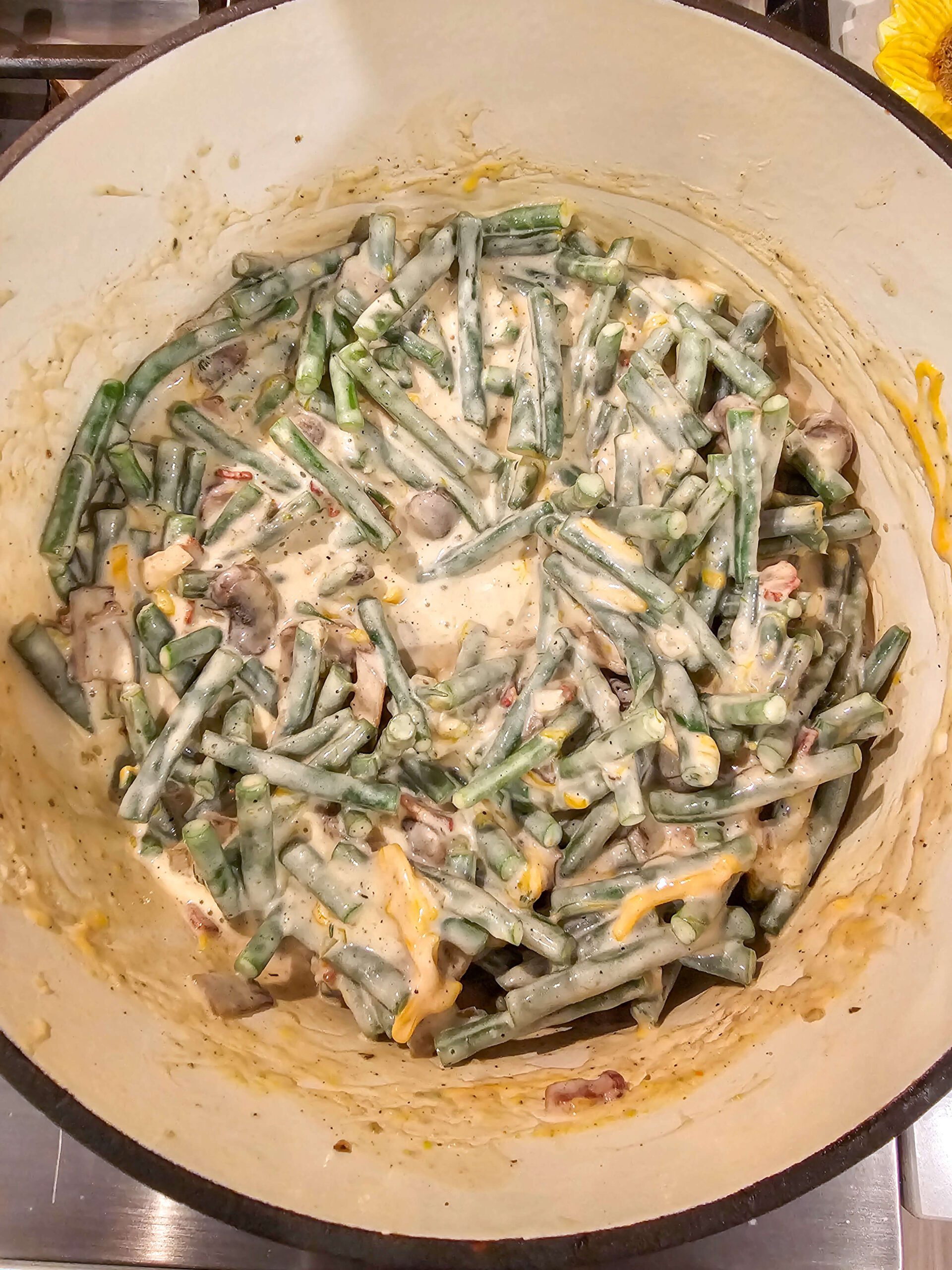 COMBINE THE CREAM SAUCE AND THE BLANCHED GREEN BEANS
