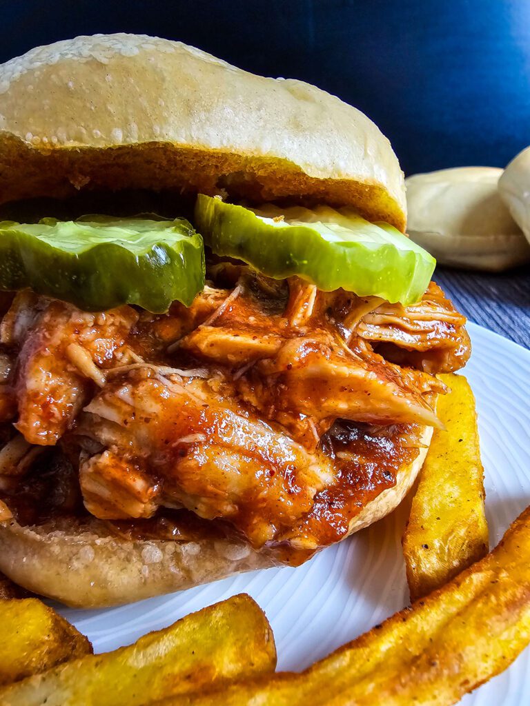 TWO HANDS HOLDING THE 