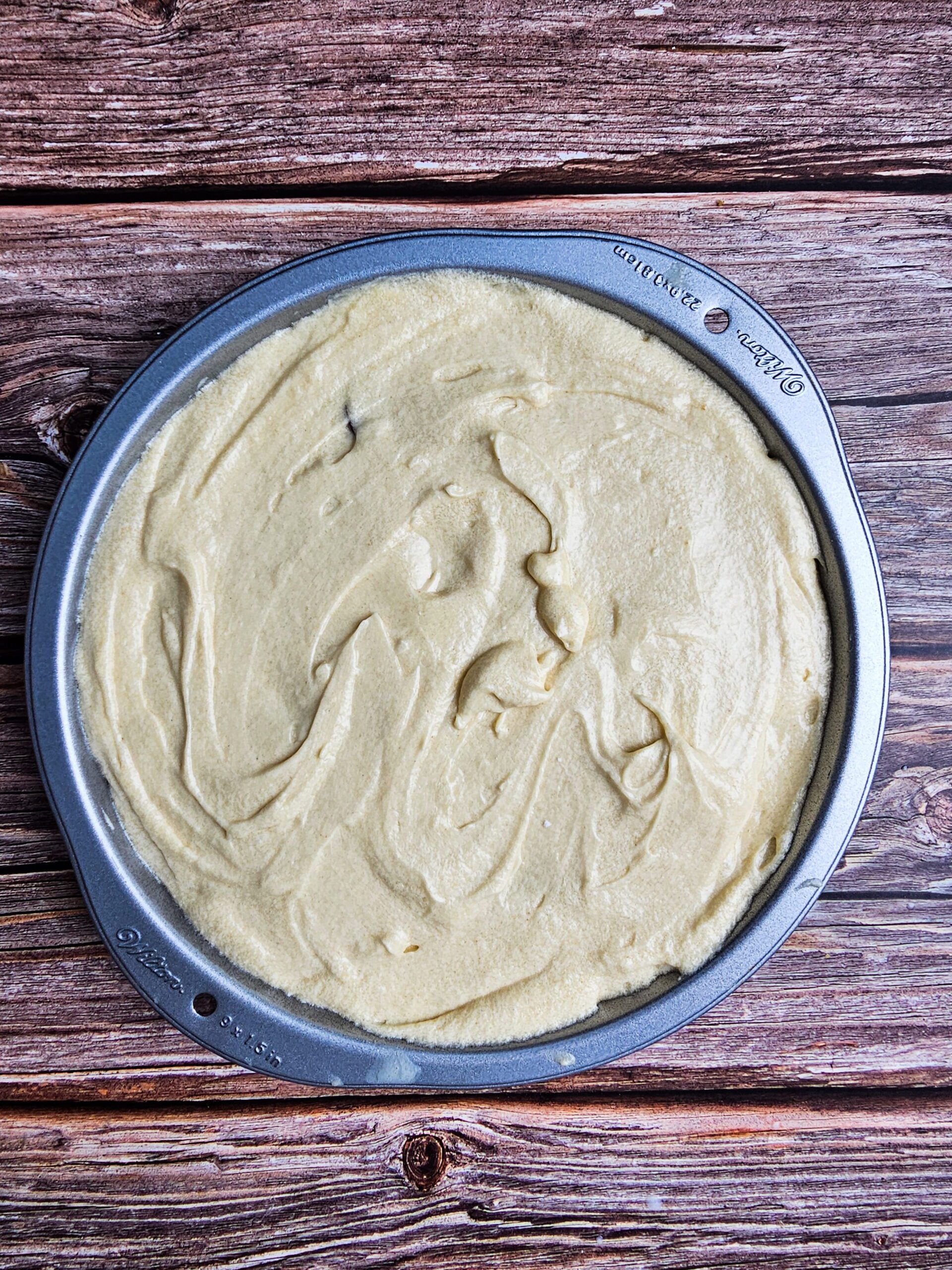 SPRED THE BATTER OVER THE PLUMS