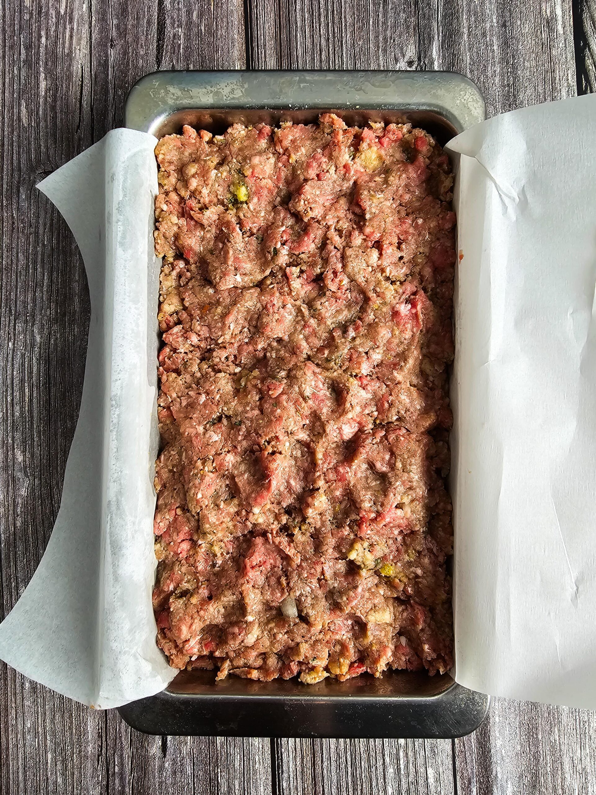 FILL A 9 X 5 LOAF PAN LINED WITH PARCHMENT PAPER