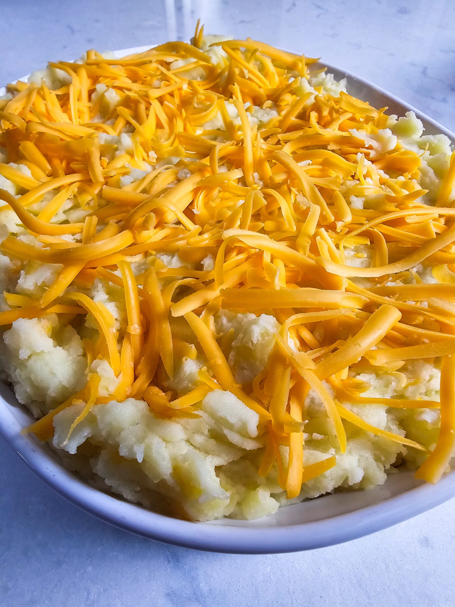 TOP WITH FRESHLY SHREDDED CHEESE