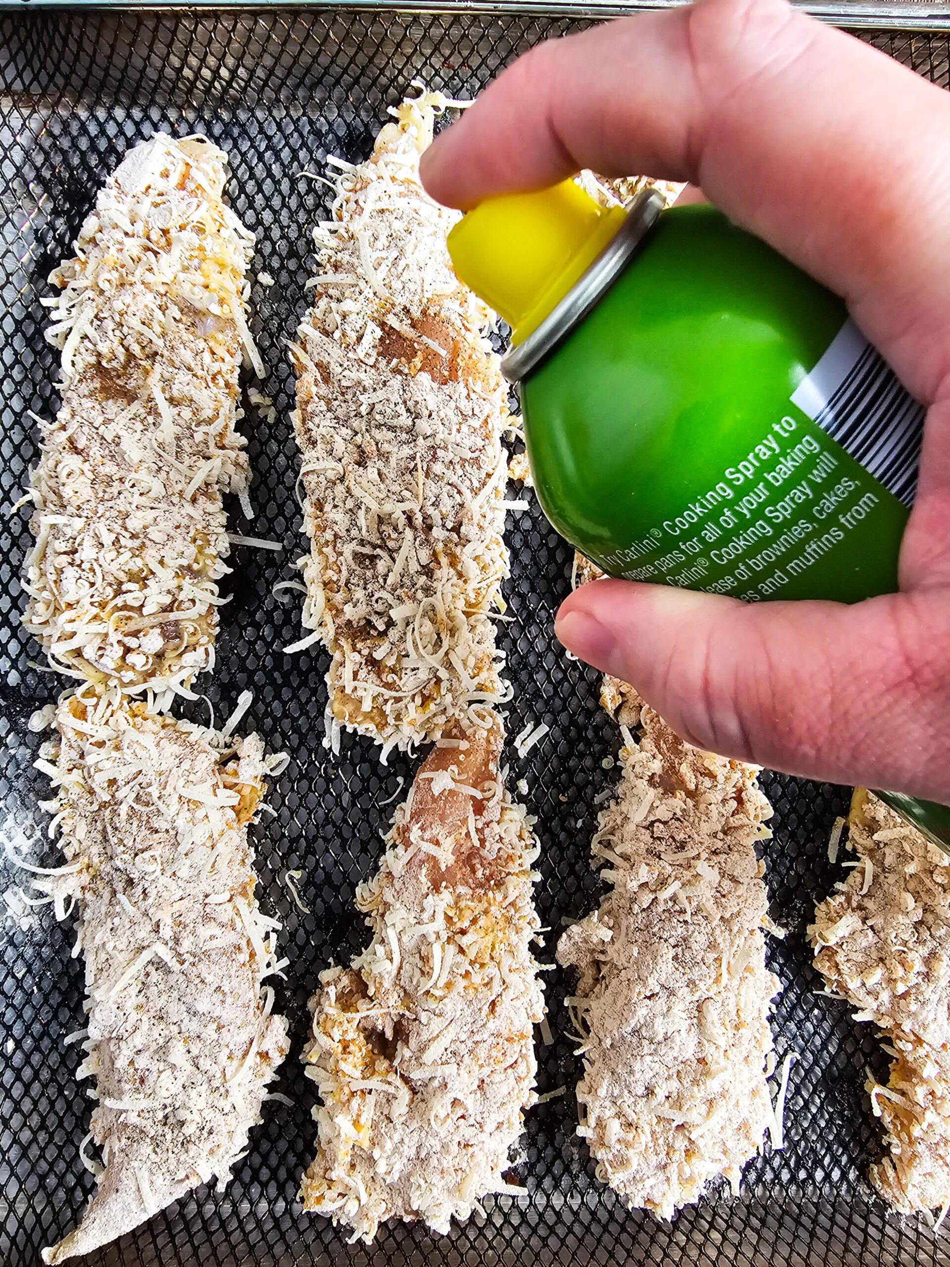 SPRAY THE CHICKEN TENDERS WITH COOKING SPRAY, OLIVE OIL, OR BUTTER