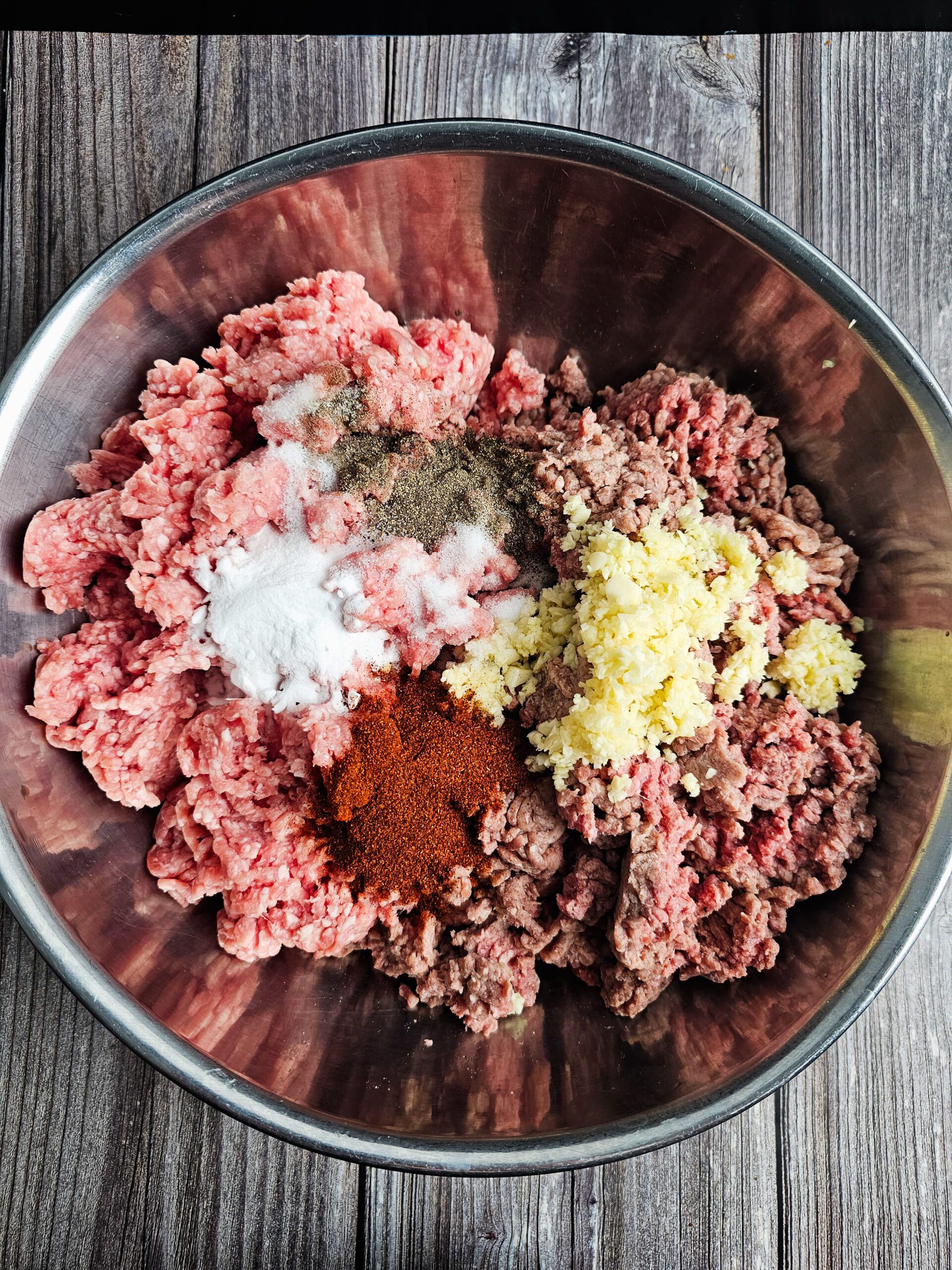 COMBINE THE INGREDIENTS FOR THE MEAT MIXTURE