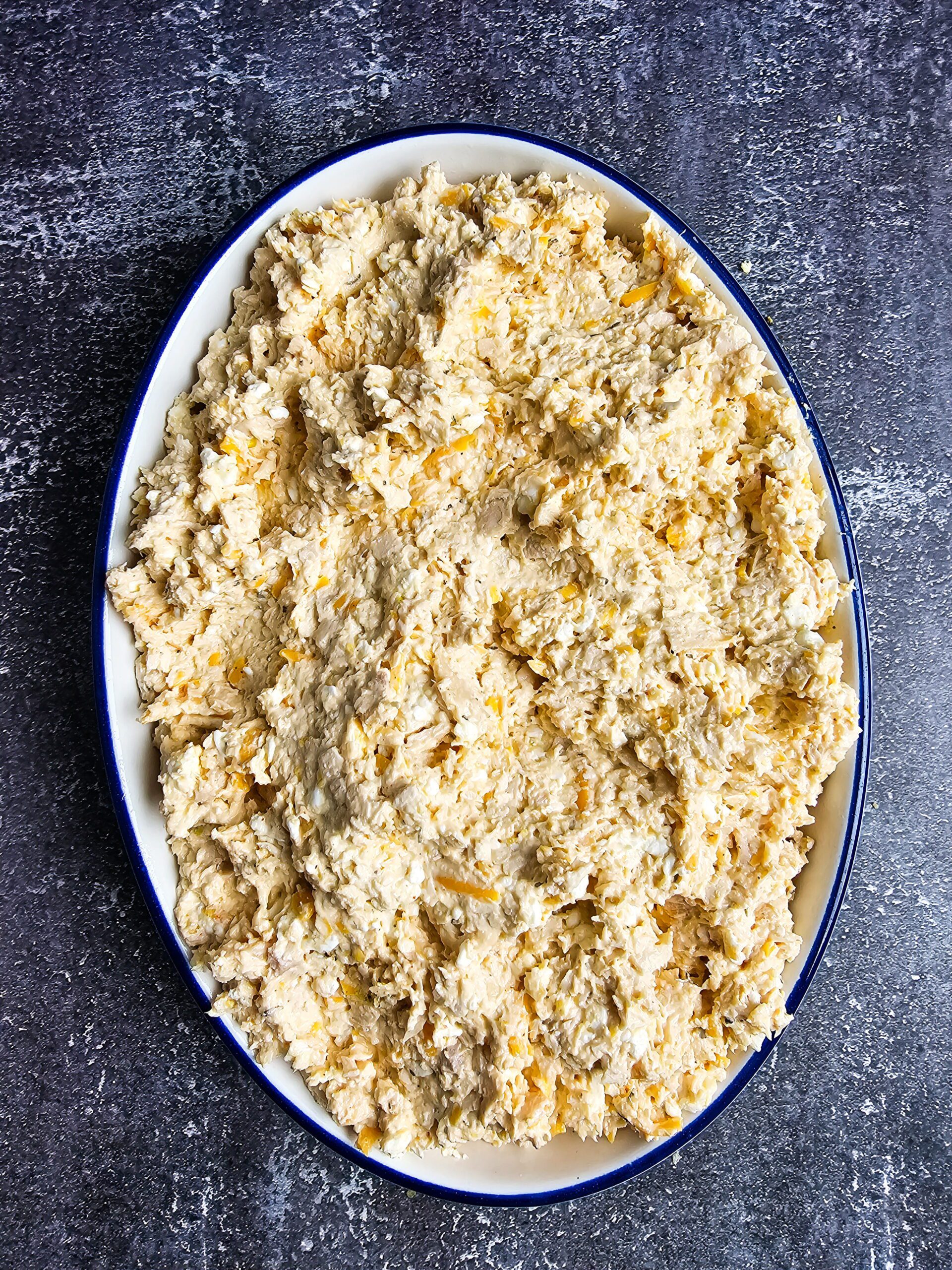 low carb chicken casserole assembled in dish before topping