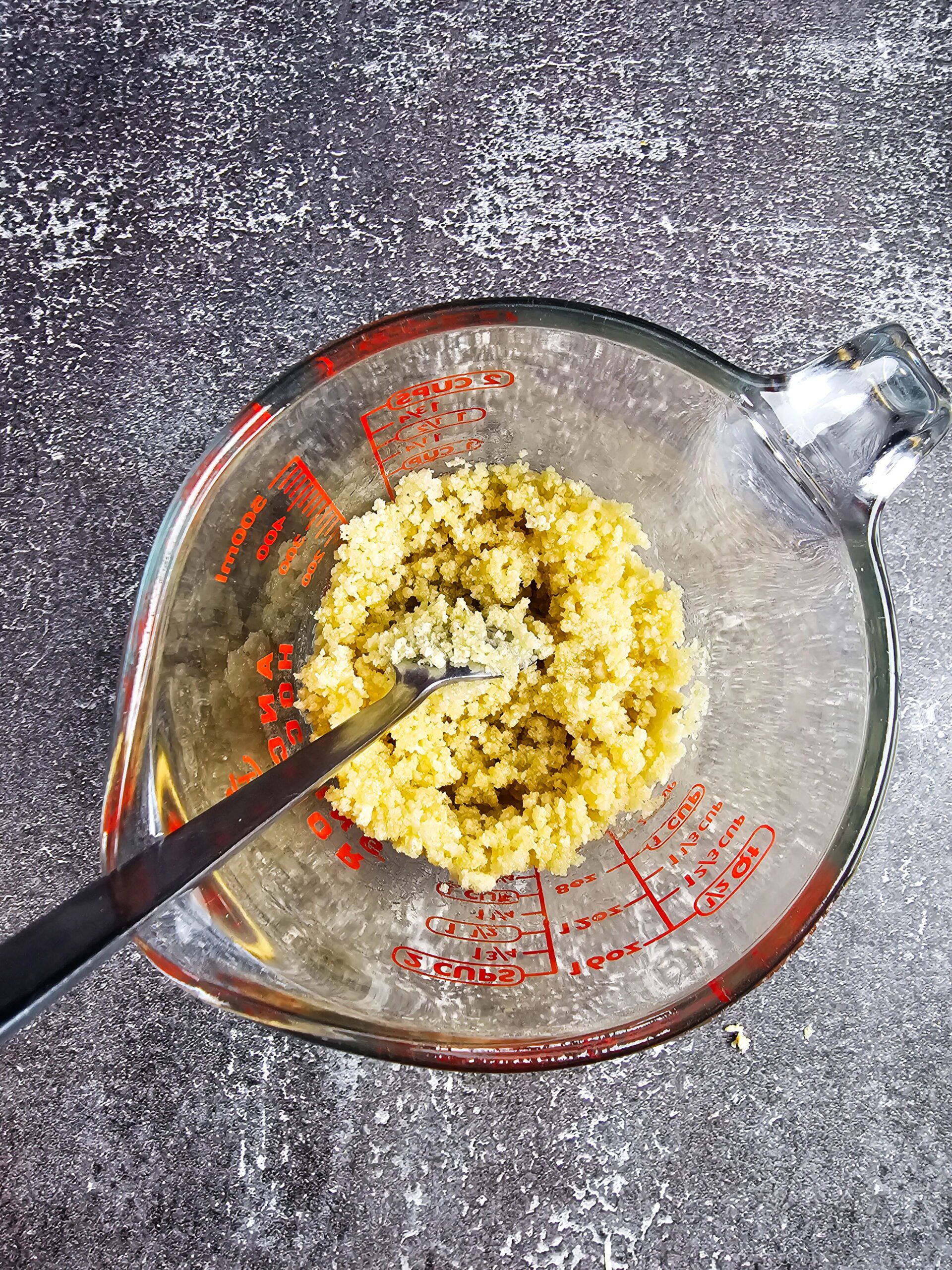 adding pork rind parmesan topping to keto chicken casserole