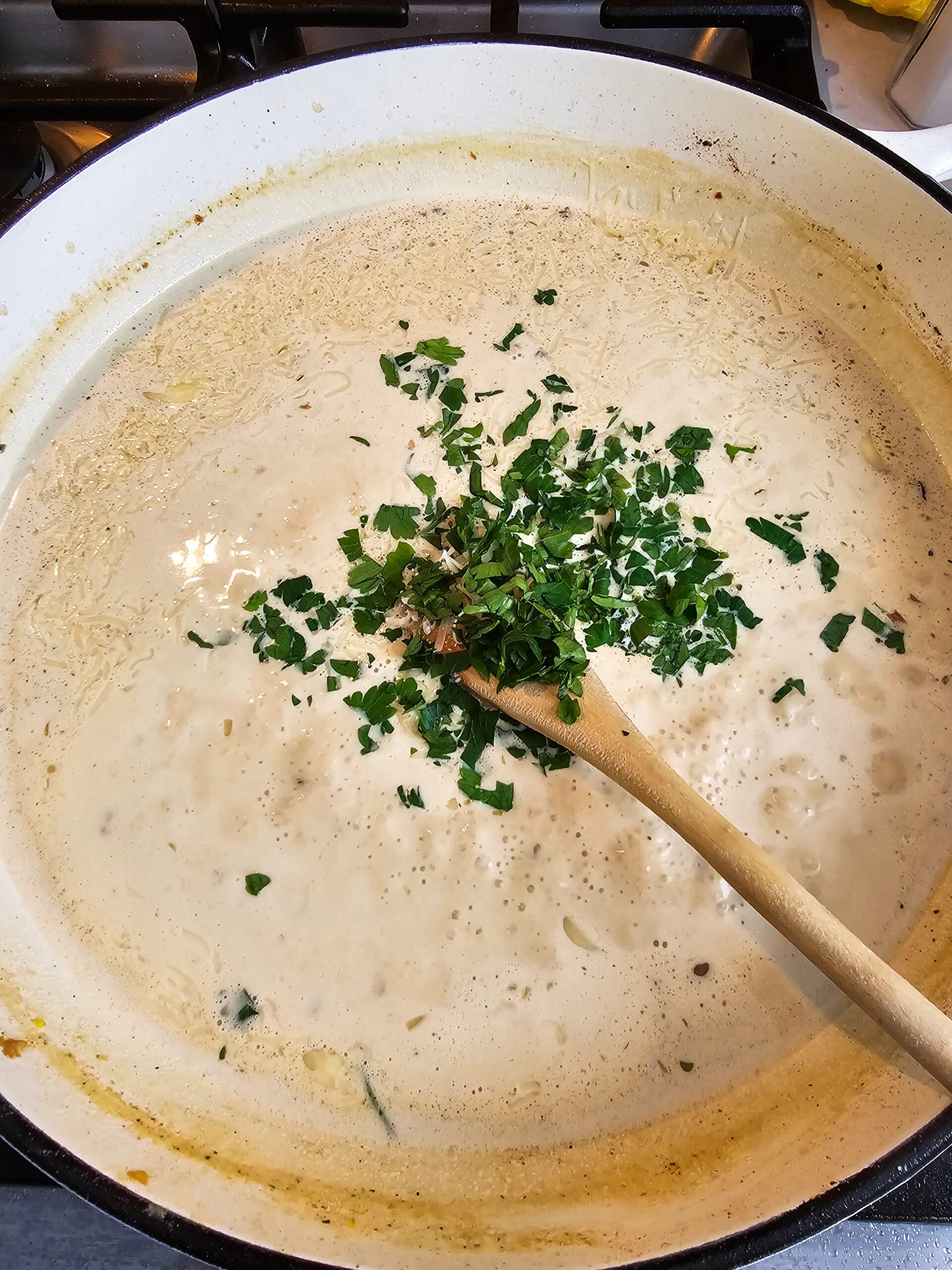 Heavy cream lemon juice and Parmesan stirred into caramelized garlic skillet making restaurant style creamy garlic chicken sauce