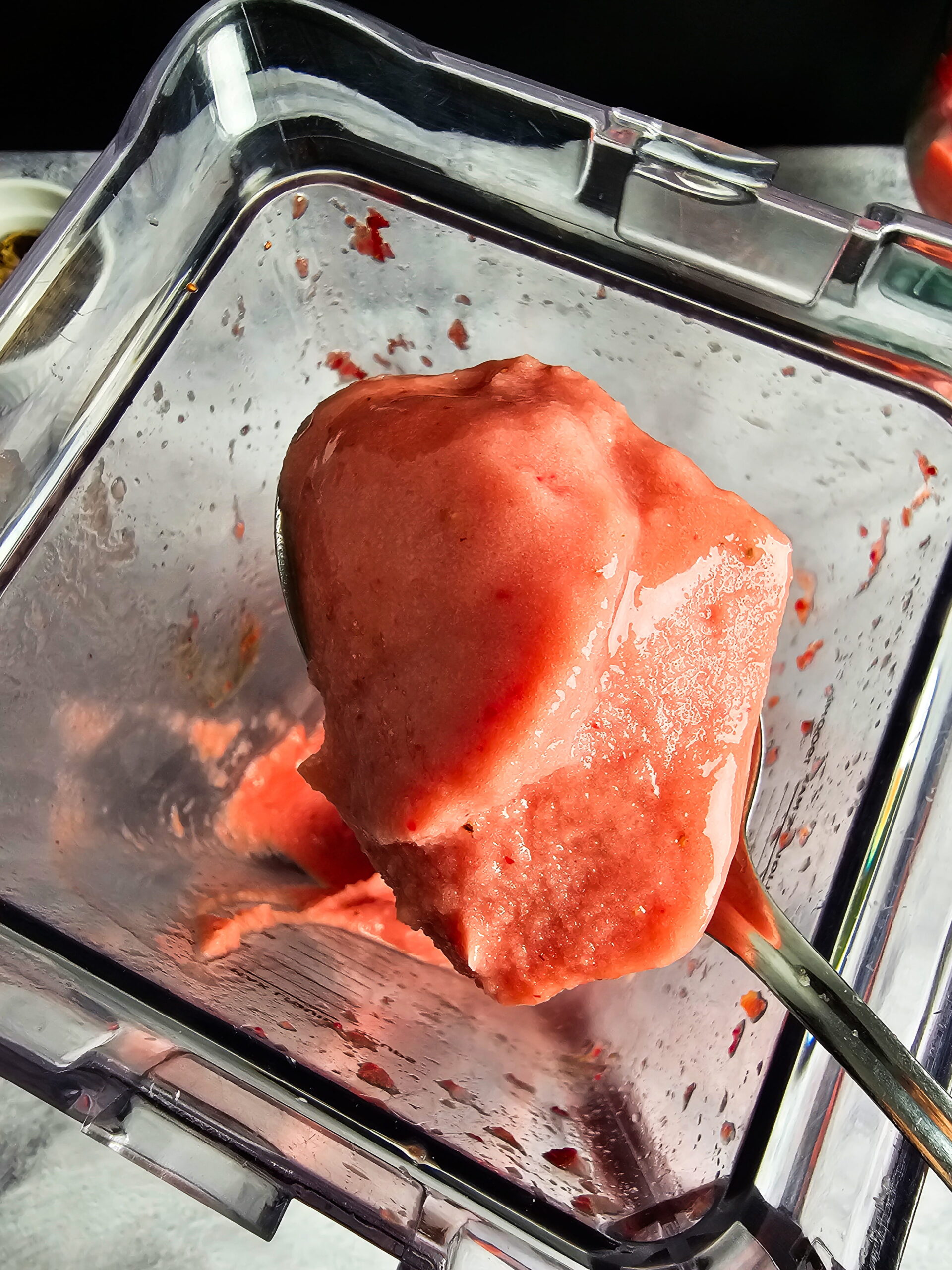 check the consistency of the watermelon strawberry smoothie bowl
